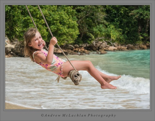 Ava on swing at Boston Bay, Jamaica
